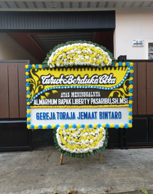 Papan Bunga Duka di Uritetu